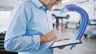 自動車診断ハードウェアを使用するワークショップ従業員