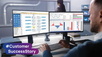 Eine Person, die an einem Arbeitsplatz mit zwei Bildschirmen arbeitet, auf denen ETAS-Software-Dashboards und Workflow-Diagramme mit dem Branding einer Kundenerfolgsgeschichte angezeigt werden.
